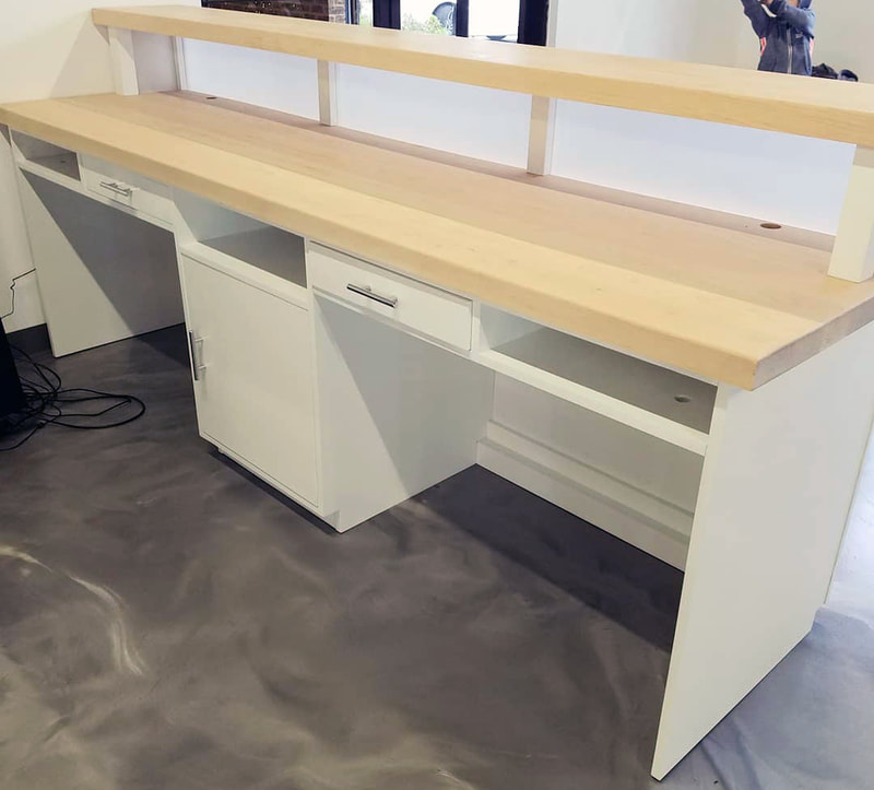 Roots Salon, Cookeville, TN
Custom salon reception desk with honeycomb pattern & LED lighting