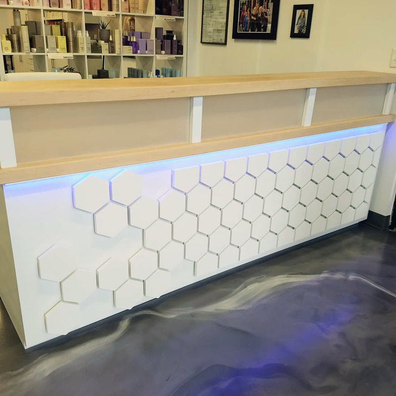 Roots Salon, Cookeville, TN
Custom salon reception desk with honeycomb pattern & LED lighting